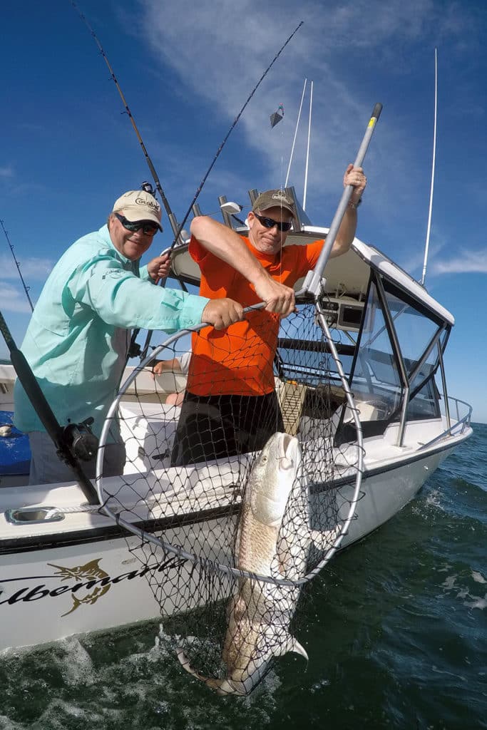 netting a redfish