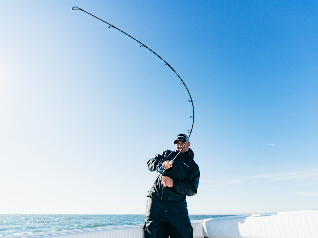 Fighting a striped bass on a spinning rod