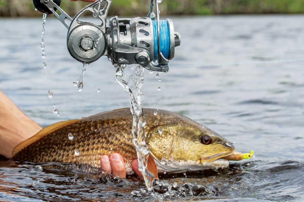 Fully-sealed fishing reel