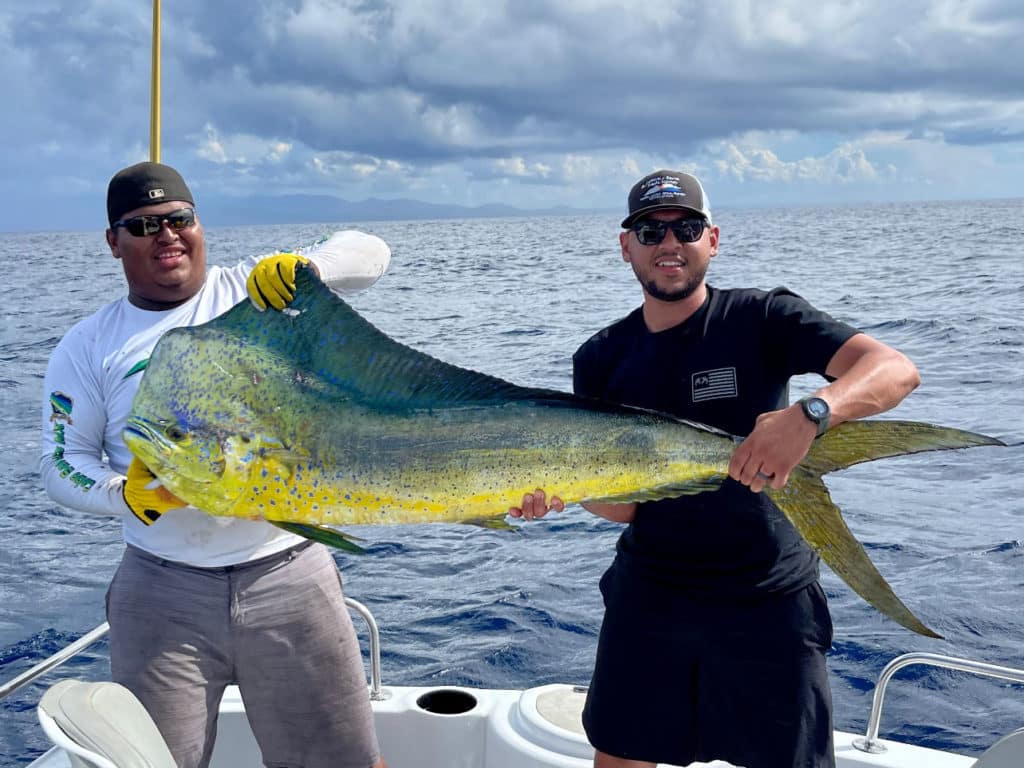 Randy Romero with giant dolphin