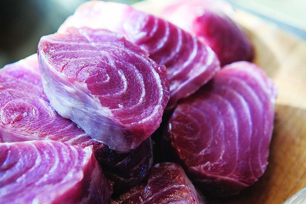 Tuna steaks showing the typically reddish meat